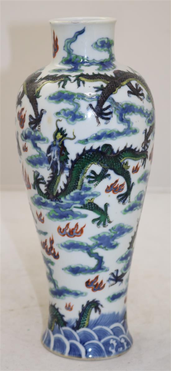 A Chinese clobbered blue and white meiping, 19th century, 26cm